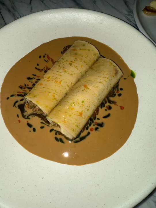 Braised ox tail “cannelloni,” Cotija cheese & creamy sauce (least strong of the mains we tried)