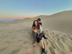 Sitting out on the sand at dusk