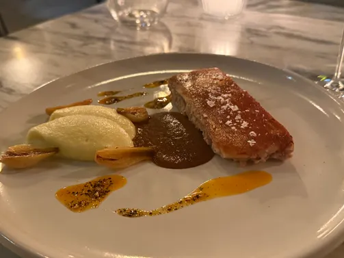 Suckling pig, potato purée, chorizo sauce & onion