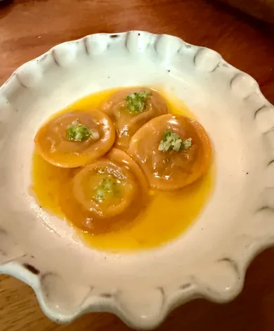Short rib ravioli, carrots and chile serrano