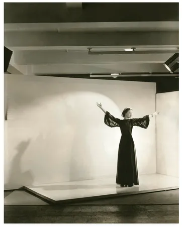 Mary Taylor with arms extended by Cecil Beaton