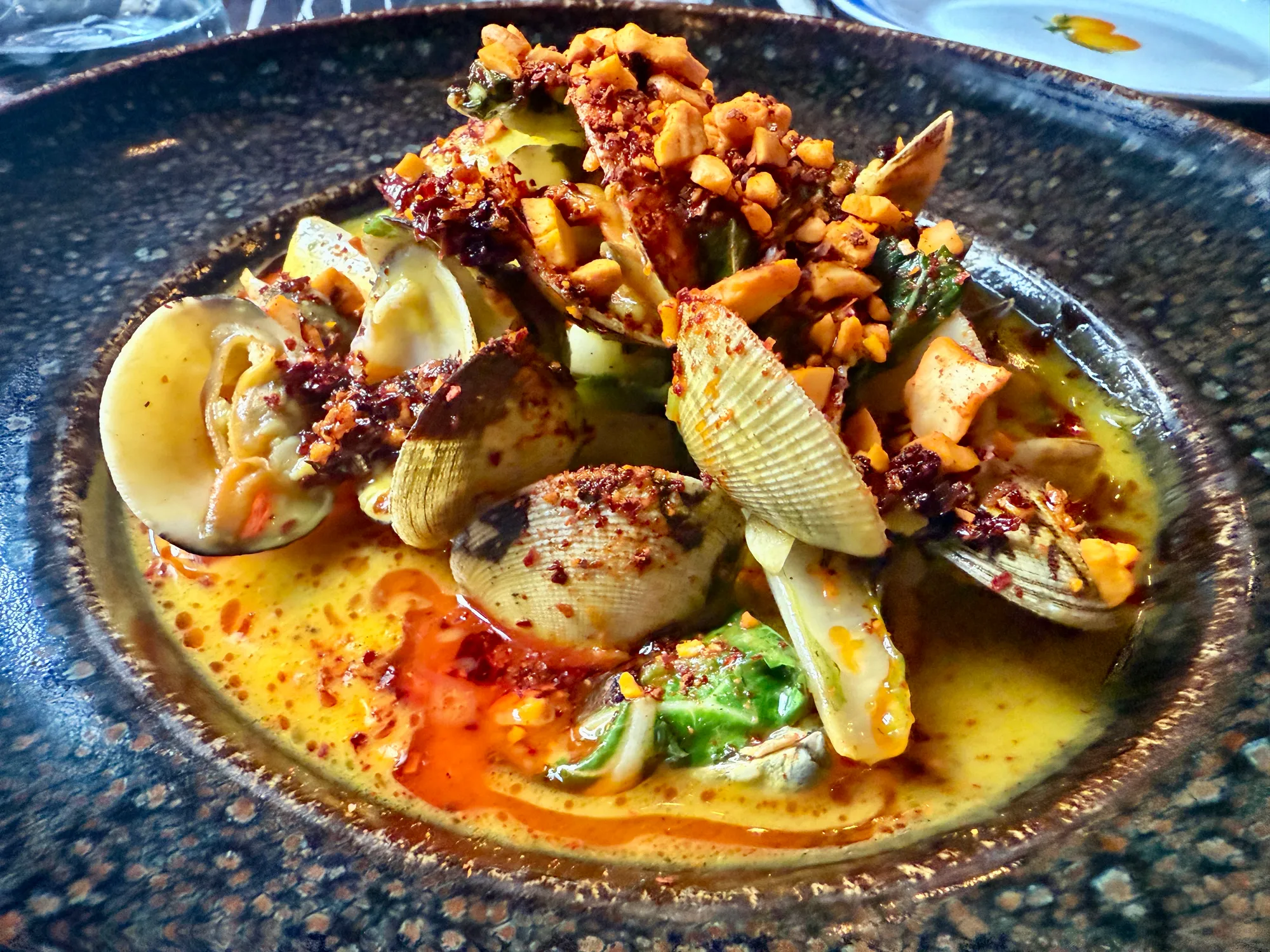 Clams in chilli butter, with cashews