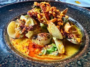 Clams in chilli butter, with cashews